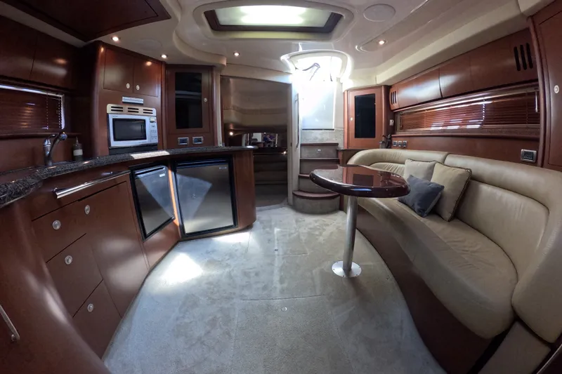 Slide: The Image of Luxurious interior of a 2007 Sea Ray 44 Sundancer yacht with modern amenities. - 61