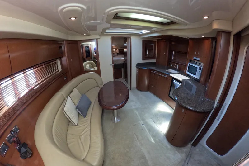 Slide: The Image of Luxurious interior of 2007 Sea Ray 44 Sundancer yacht with elegant wood finishes. - 52