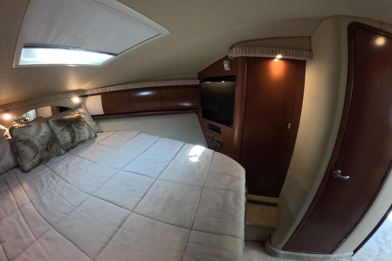 Slide: The Image of Luxurious cabin interior of 2007 Sea Ray 44 Sundancer yacht with cozy bedding. - 60