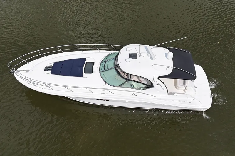 Slide: The Image of 2007 Sea Ray 44 Sundancer yacht cruising on calm waters, aerial view. - 3