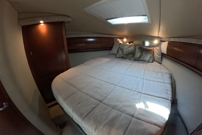 Slide: The Image of Luxurious cabin interior of 2007 Sea Ray 44 Sundancer yacht with cozy bedding. - 59