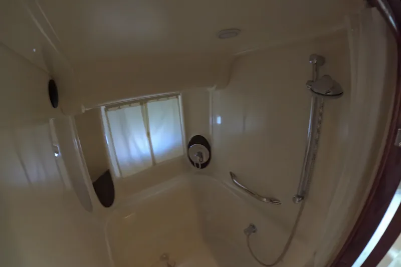 Slide: The Image of Bathroom interior of 2007 Sea Ray 44 Sundancer yacht with shower and window. - 39
