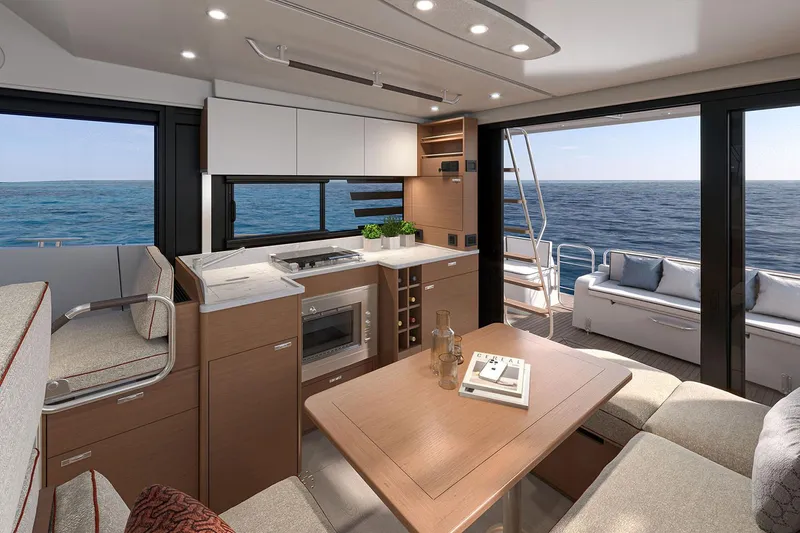 Slide: The Image of Manufacturer Provided Image: Interior of 2026 Beneteau Swift Trawler 37 Fly, featuring modern kitchen and ocean view. - 5