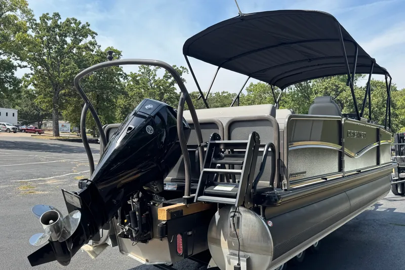 Slide: The Image of 2027 Premier 230 Sunsation RL - CL pontoon boat with canopy and outboard motor. - 14
