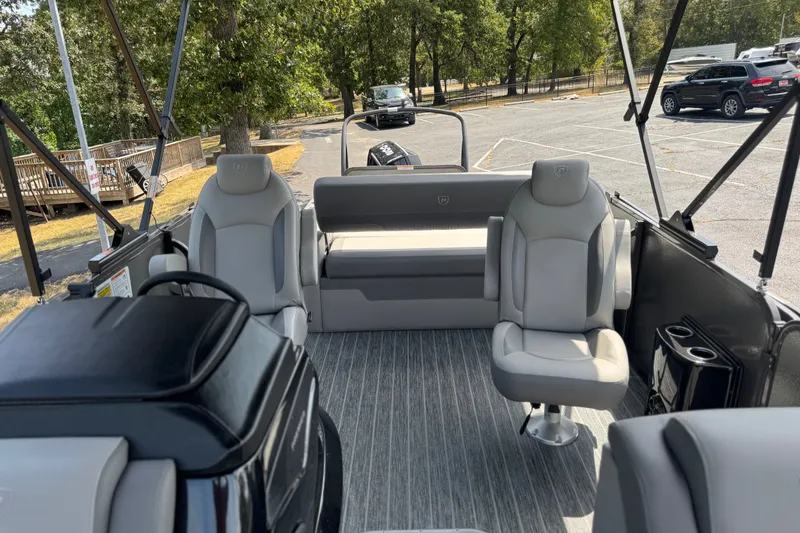 Slide: The Image of Interior of 2027 Premier 230 Sunsation RL - CL pontoon boat with seating and steering console. - 6