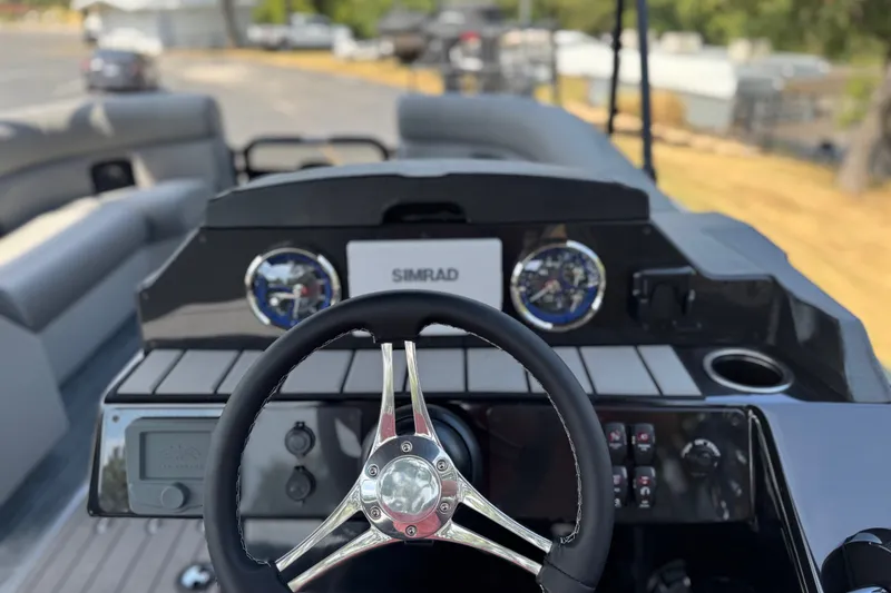 Slide: The Image of Steering console of 2027 Premier 230 Sunsation RL - CL pontoon boat. - 12