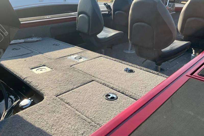 Slide: The Image of 2020 Tracker Targa V-19 WT Tournament Edition boat interior with seating and storage compartments. - 16