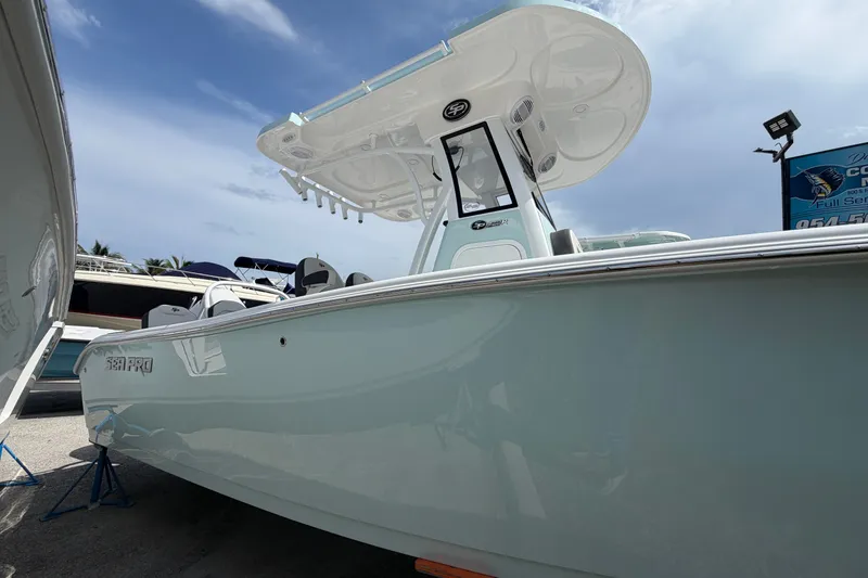 Slide: The Image of 2026 Sea Pro 245FLXR Sandbar boat with sleek design under a clear sky. - 3