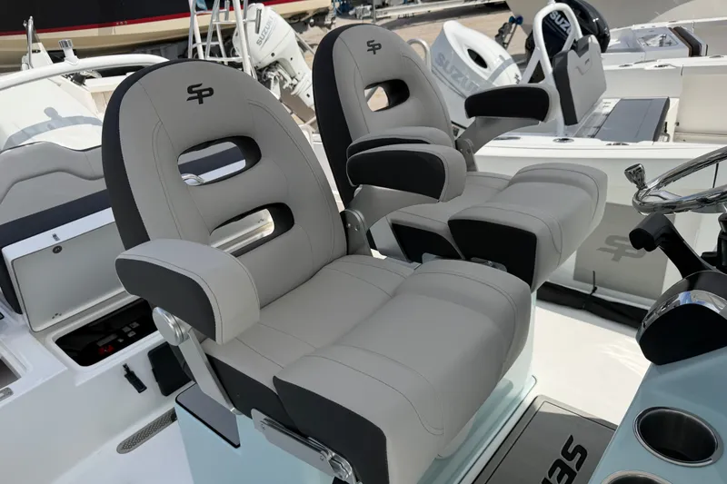 Slide: The Image of Luxury seating on 2026 Sea Pro 245FLXR Sandbar boat, featuring ergonomic design and premium materials. - 11