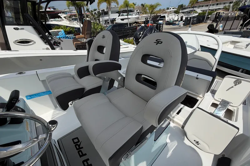 Slide: The Image of Luxury seating on 2026 Sea Pro 245FLXR Sandbar boat, featuring modern design and comfort. - 12