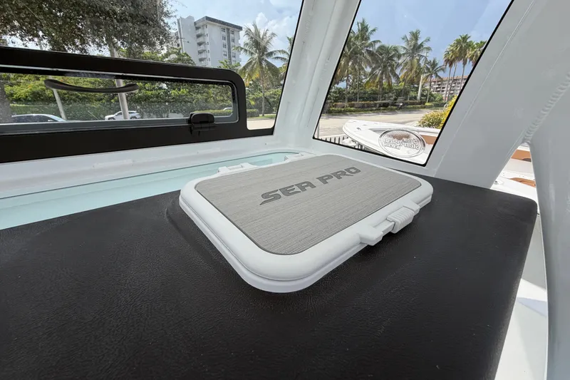 Slide: The Image of Interior view of 2026 Sea Pro 245FLXR Sandbar boat with branded compartment. - 15