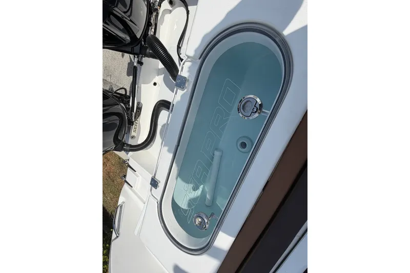 Slide: The Image of Livewell on 2027 Sea Pro 262 DLX boat, featuring sleek design and functionality. - 50