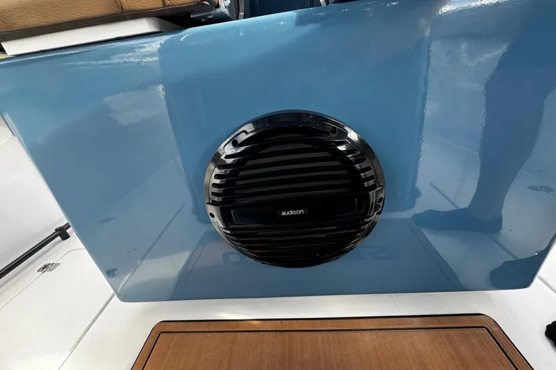 Slide: The Image of 2026 Sea Pro 292 DLX boat with Audison speaker on blue panel. - 18