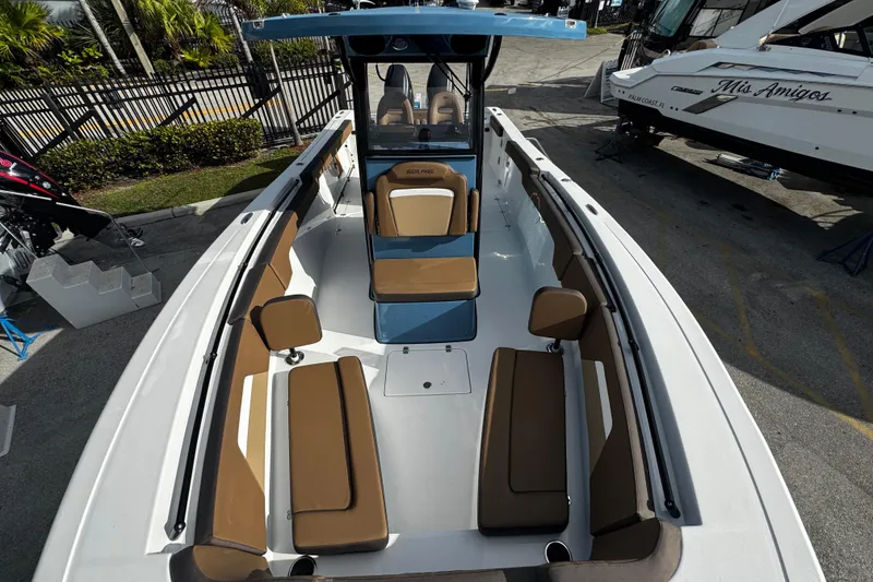 Slide: The Image of 2026 Sea Pro 292 DLX boat with spacious seating and sleek design. - 9
