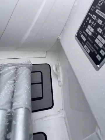 Slide: The Image of Close-up of a Zodiac Nomad Rib Alu 2.7 interior with aluminum parts and labeling. - 15