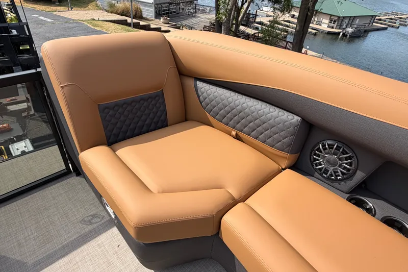Slide: The Image of Luxurious seating on 2027 Harris Sunliner 250 boat with quilted accents and speaker system. - 25