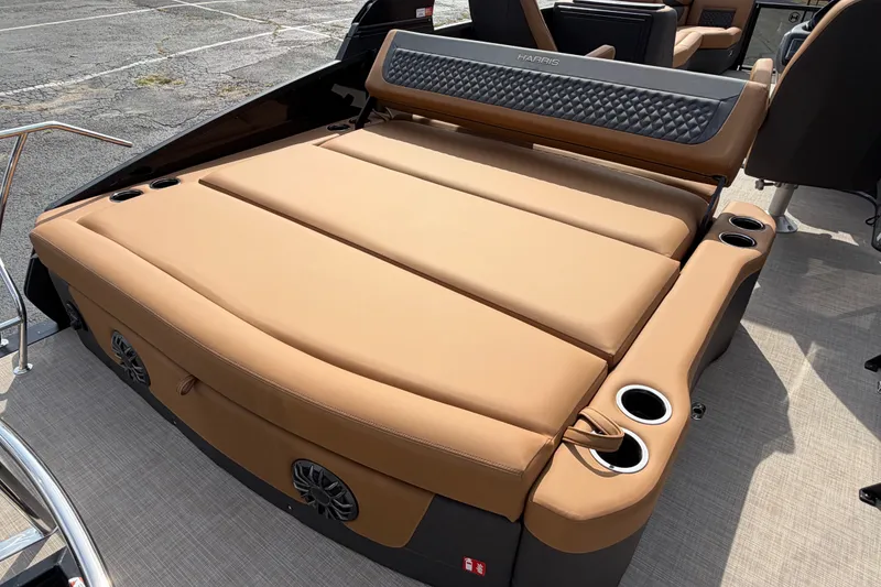 Slide: The Image of Luxurious seating on 2027 Harris Sunliner 250 boat with cup holders and speakers. - 19