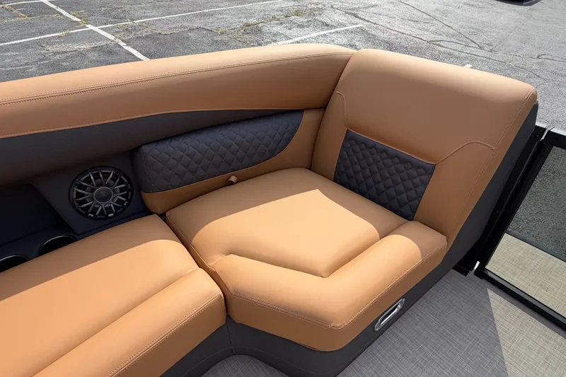 Slide: The Image of Luxurious seating on 2027 Harris Sunliner 250 boat with tan and quilted accents. - 22