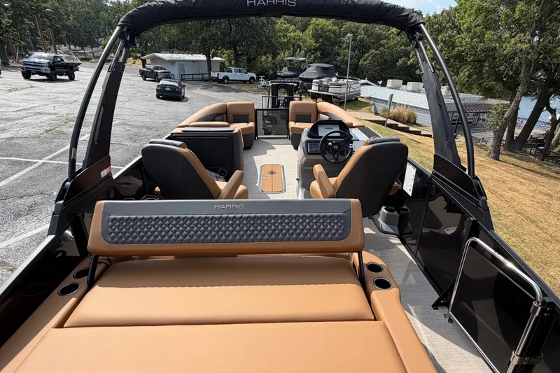 Slide: The Image of Interior view of 2027 Harris Sunliner 250 pontoon boat with luxurious seating and modern design. - 18