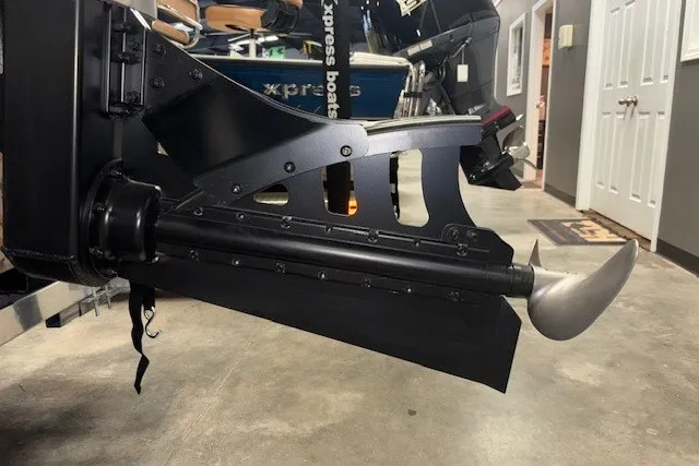 Slide: The Image of 2026 Xpress Bayou 180 boat motor detail in showroom setting. - 8