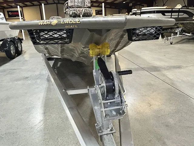 Slide: The Image of War Eagle 2170 Blackhawk 2027 on a trailer in a warehouse. - 3