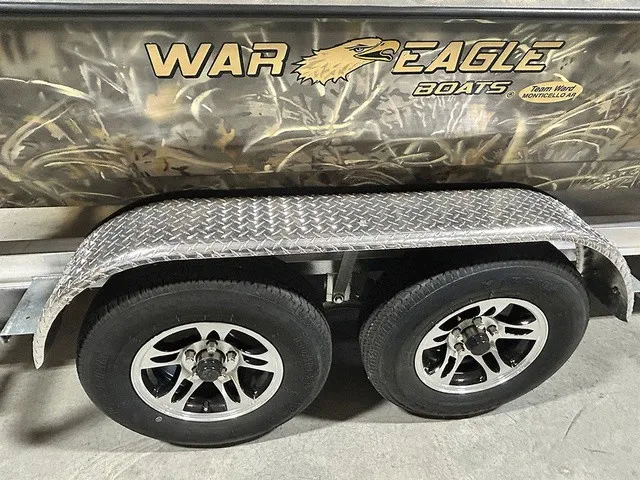 Slide: The Image of War Eagle 2170 Blackhawk boat with camouflage pattern and dual axle. - 12