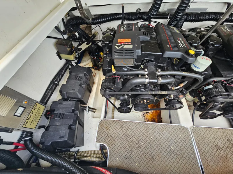 Slide: The Image of The engine compartment of a 1998 Formula 330 Sun Sport with two powerful V8 engines. - 17