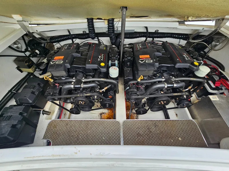 Slide: The Image of The engine compartment of a 1998 Formula 330 Sun Sport with twin V8 engines. - 15