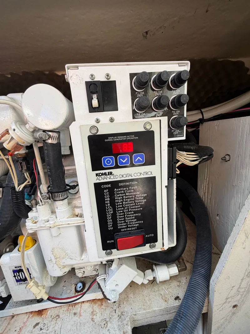 Slide: The Image of Kohler generator control in a 2006 Sea Ray Sundancer 260. - 19