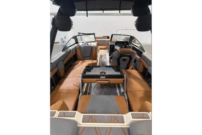 Slide: The Image of 2026 Malibu M230 boat interior with luxurious seating and modern design. - 7