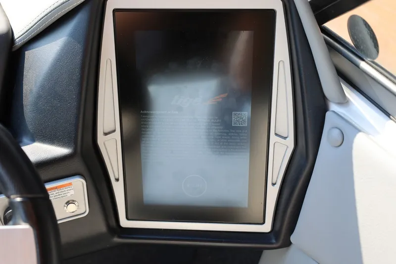 Slide: The Image of Touchscreen display in 2020 Tigé R20 boat dashboard, featuring control interface and QR code. - 38