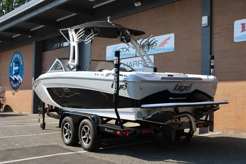 Slide: The Image of 2020 Tigé R20 boat on trailer outside Bjornson Marine dealership. - 4