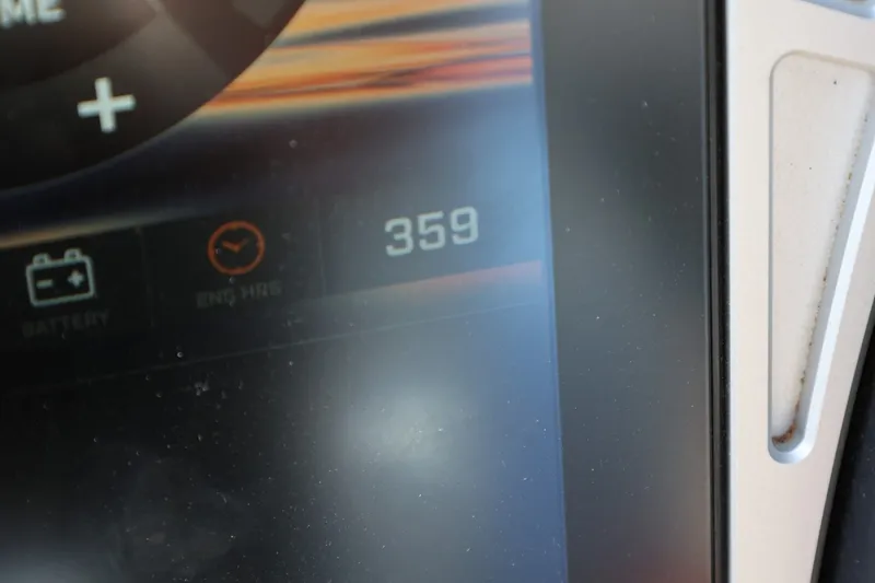 Slide: The Image of Close-up of 2020 Tigé R20 boat dashboard displaying 359 engine hours. - 40