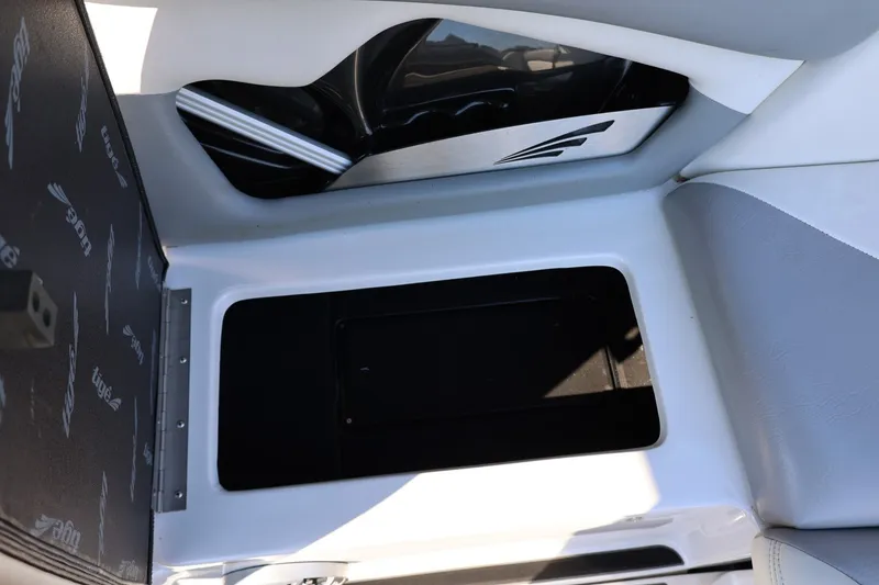 Slide: The Image of 2020 Tigé R20 boat interior storage compartment with sleek design and modern finishes. - 30