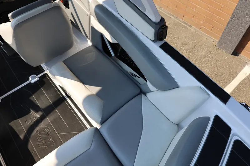 Slide: The Image of 2020 Tigé R20 boat interior with gray and white seating, showcasing modern design. - 27