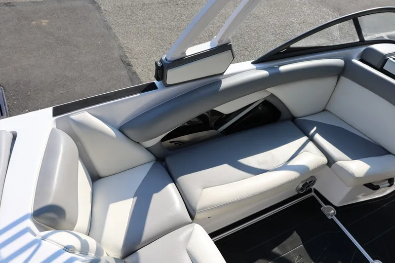 Slide: The Image of 2020 Tigé R20 boat interior with gray and white seating, showcasing modern design. - 25