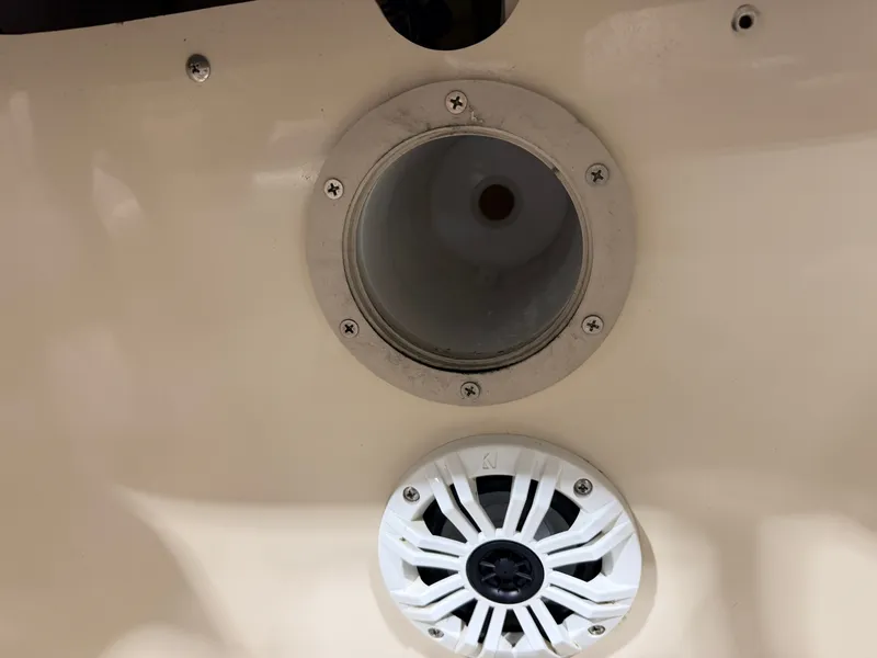 Slide: The Image of Close-up of a speaker and a round opening on a boat. - 24
