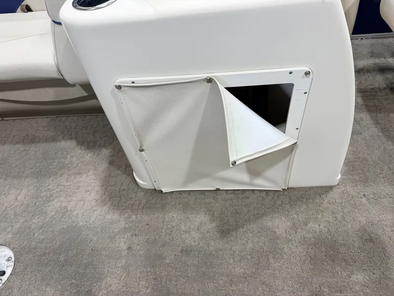Slide: The Image of A white boat with a removable fabric panel revealing a storage compartment. - 17