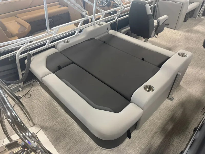 Slide: The Image of The image shows a luxurious boat lounge with gray upholstery and stainless steel cup holders. - 20