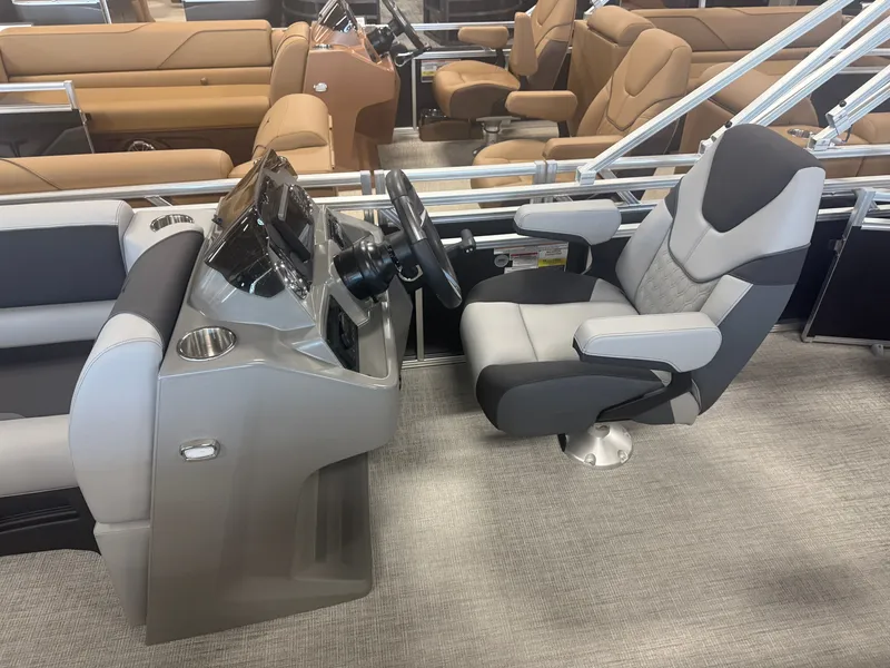 Slide: The Image of The image shows a modern boat helm with a cushioned captain's chair and sleek dashboard. - 11