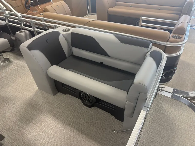 Slide: The Image of Gray and black bench seat on a boat with cup holders. - 9