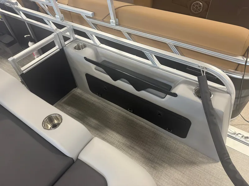 Slide: The Image of Interior view of a modern boat with comfortable seating and stainless steel cup holders. - 24