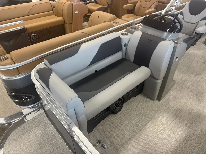 Slide: The Image of Interior of a modern boat with gray and black seating. - 8