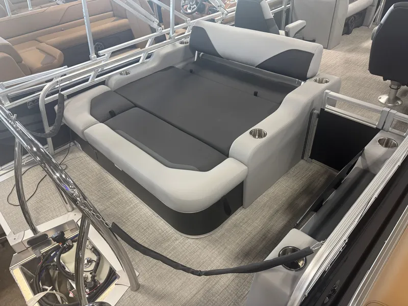 Slide: The Image of Interior of a modern pontoon boat with gray and black upholstery. - 21
