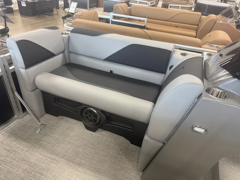 Slide: The Image of The image shows a modern boat seat with gray and black upholstery. - 29