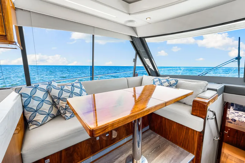 Slide: The Image of Luxurious interior of 2022 Riviera 505 SUV yacht with ocean view. - 29