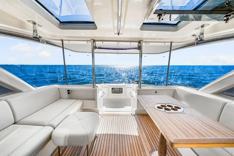 Slide: The Image of Luxurious interior of 2022 Riviera 505 SUV yacht with ocean view. - 38