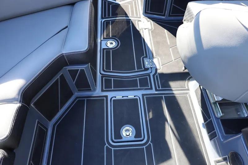 Slide: The Image of Interior view of 2022 Supreme ZS252 boat, featuring sleek seating and modern flooring design. - 41