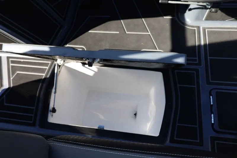 Slide: The Image of Open storage compartment in 2022 Supreme ZS252 boat interior. - 43