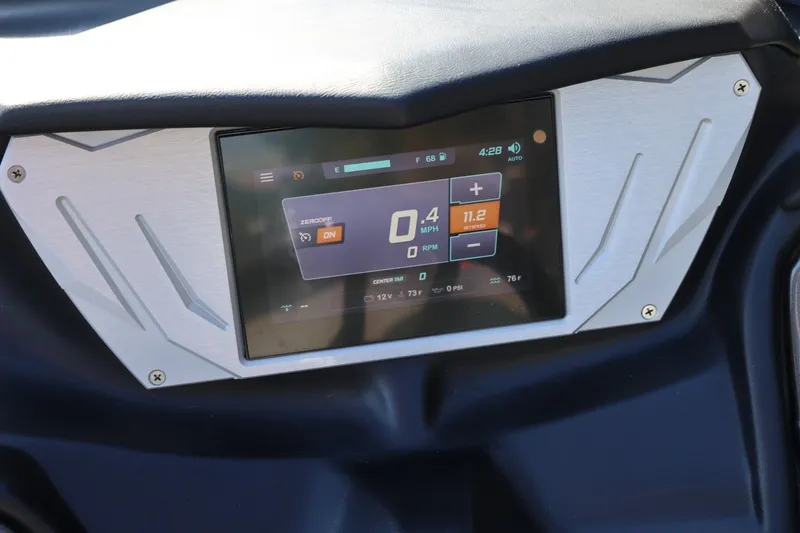 Slide: The Image of 2022 Supreme ZS252 dashboard display showing speed, temperature, and settings. - 49